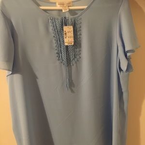Baby blue blouse.